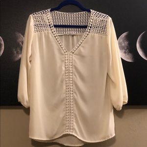 Sheer top with cotton lace accents.